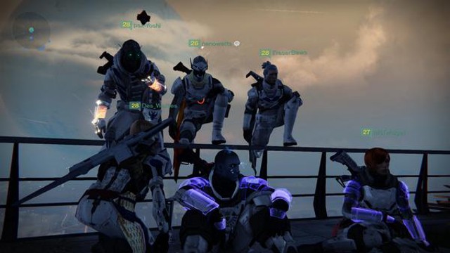 Destiny screenshot: 6 Guardians posing in The Tower after conquering the Vault of Glass