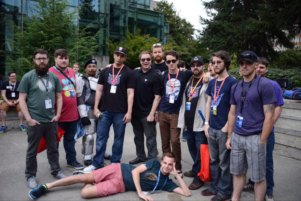 Around a dozen Math Class members posing at PAX 2015 with DeeJ